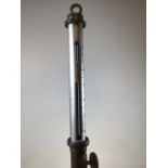 A brass gimballed ships type stick barometer and thermometer marked H Davidson, Glasgow. Length