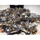 A vast quantity of watches in a metal trunk. All untested, please do not ask for condition reports!