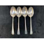 Four London 1924 serving spoons. 303 grams.