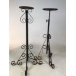 Two metal garden stands - one is adjustable