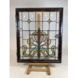 A Victorian stained glass window in metal frame. Some areas of damage to glass. See pictures. W: