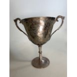 A Silver plated trophy cup with engraving. W:29cm x D:10cm x H:28cm