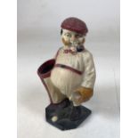Golfing interest. A cold painted pipe holder modelled as a golfing figureW:13cm x H:20cm