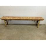 A folding mid century bench with distressed paint. W:183cm x D:28cm x H:46cm