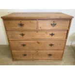 A solid pine chest of drawers with two short over three long drawers.W:108cm x D:54cm x H:93cm