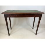 An oak Arts and crafts tiled top table.W:103cm x D:46cm x H:76cm
