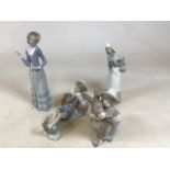 Four pieces of Lladro impressed marks to base includes boy with donkey, girl with basket and