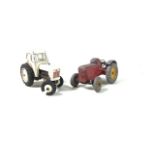 Assortment of loose vintage Dinky farm vehicles. To include two tractor models and farm machinery