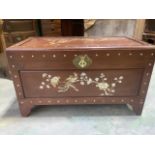 A mother of pearl inlaid oriental rosewood trunk. W:104cm x D:54cm x H:60cm
