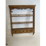 A small country pine spice rack with three drawers to base. W:56cm x H:70cm D:10cm