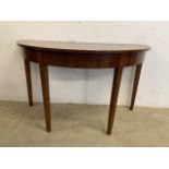 A mahogany D end table.W:126cm x D:62cm x H:74cm