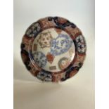 A Large Imari plate hand painted design with signature to base. W:32cm x H:32cm