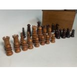 A late 19th early 20th century Chess set in box. Rosewood and possibly yew wood see photos.