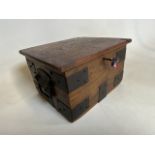 A small oak metal bound bible box with key.