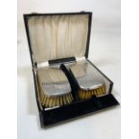 A boxed pair of gentlemans hair brushes. Birmingham 1931.