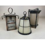 Three vintage porch lights.