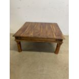 A square South American pine coffee table.W:89cm x D:89cm x H:40cm