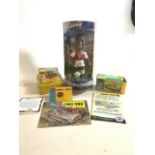 Two Boxed Corgi car with leaflets and ephemera also with a Bobblehead Sol Campbell figure.