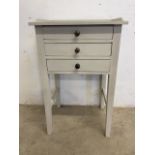 A modern painted three drawer bedside cupboard.W:49cm x D:38cm x H:78cm