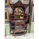 A Victorian style chiffonier side cabinet with decoratively carved mirror top above a glazed