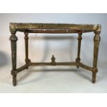 A 19th century gilt wood table base. W:90cm x D:52cm x H:60cm
