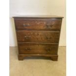 A Small oak early 20th century chest of drawers with brass handles.W:68cm x D:48cm x H:73cm