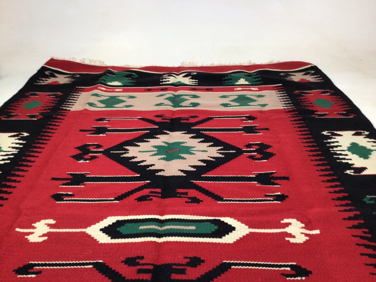 A Fine Turkish Kilim in black and red designW:123cm x H:191cm