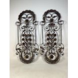 A pair of heavy large metal wall decorations.H:120cm`X W:53cm