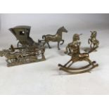 A collection of horse interest brass items including a pair of unicorns, a rocking horse and a