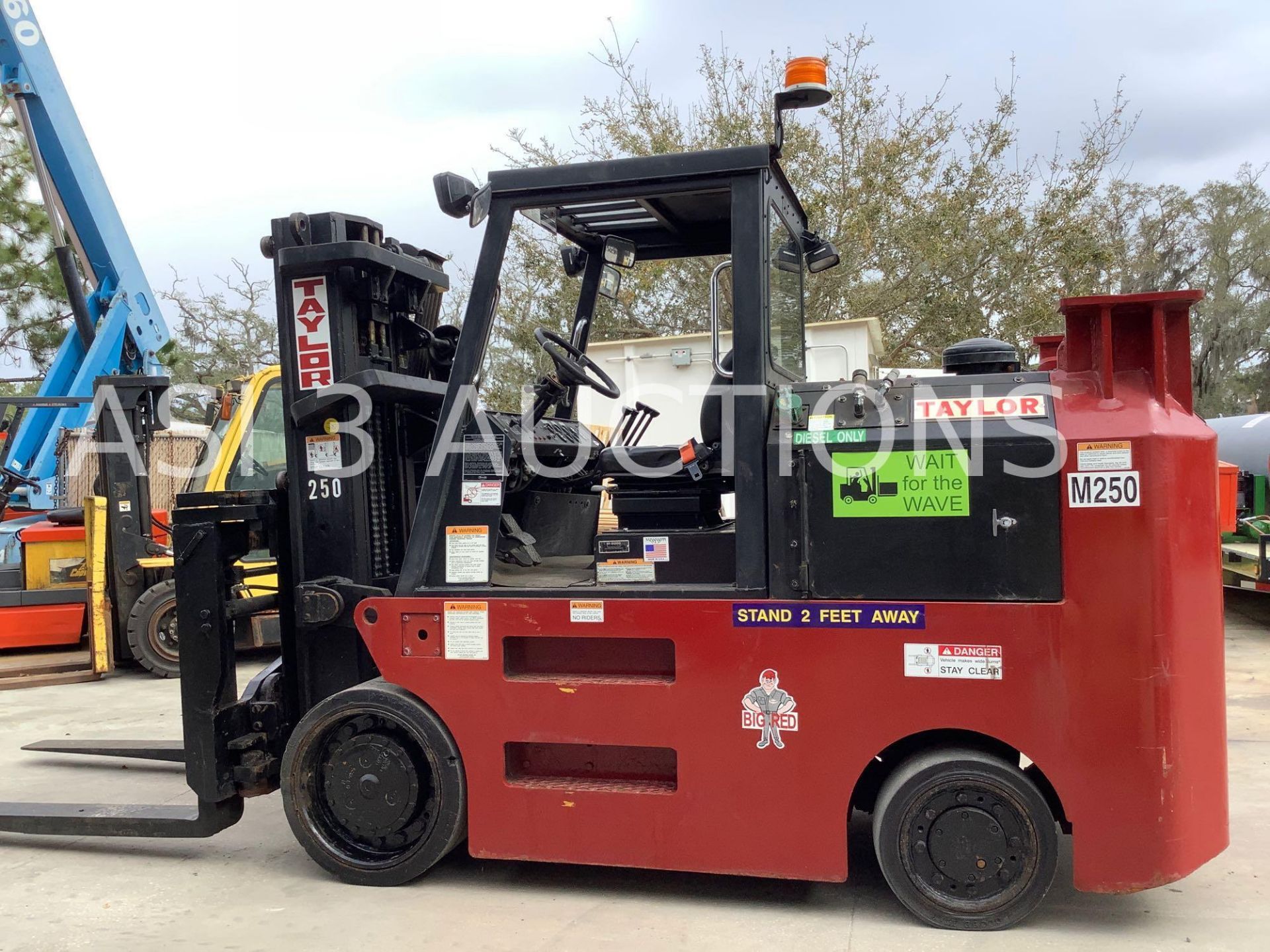TAYLOR "BIG RED" DIESEL FORKLIFT MODEL TC250, FACTORY RECONDITIONED IN 2014