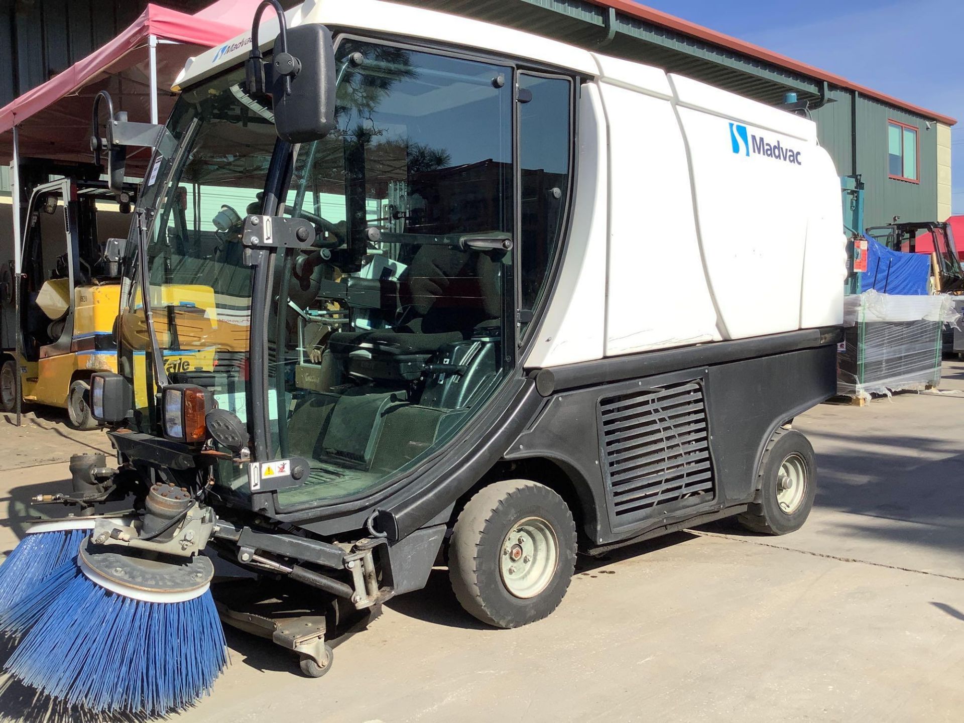 MADVAC COMPACT SWEEPER MODEL LS100 ,ENCLOSED CAB,BACK UP CAMERA, A/C AIR, EXTRA KEY