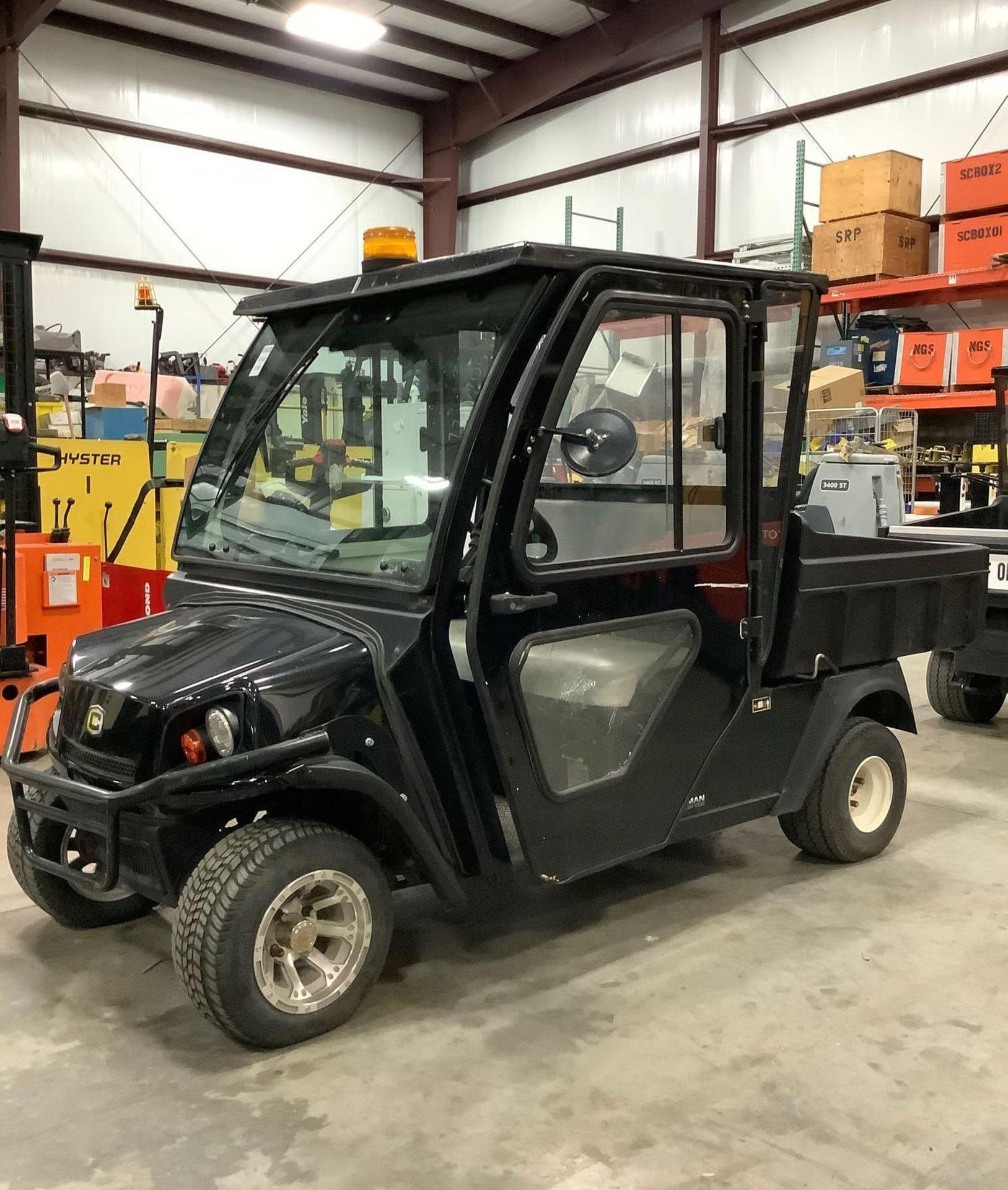 CUSHMAN HAULER 1000 UTV, ELECTRIC, ENCLOSED CAB, HEATER G200X INSIDE, MANUAL DUMP BED, BUILT IN BATT