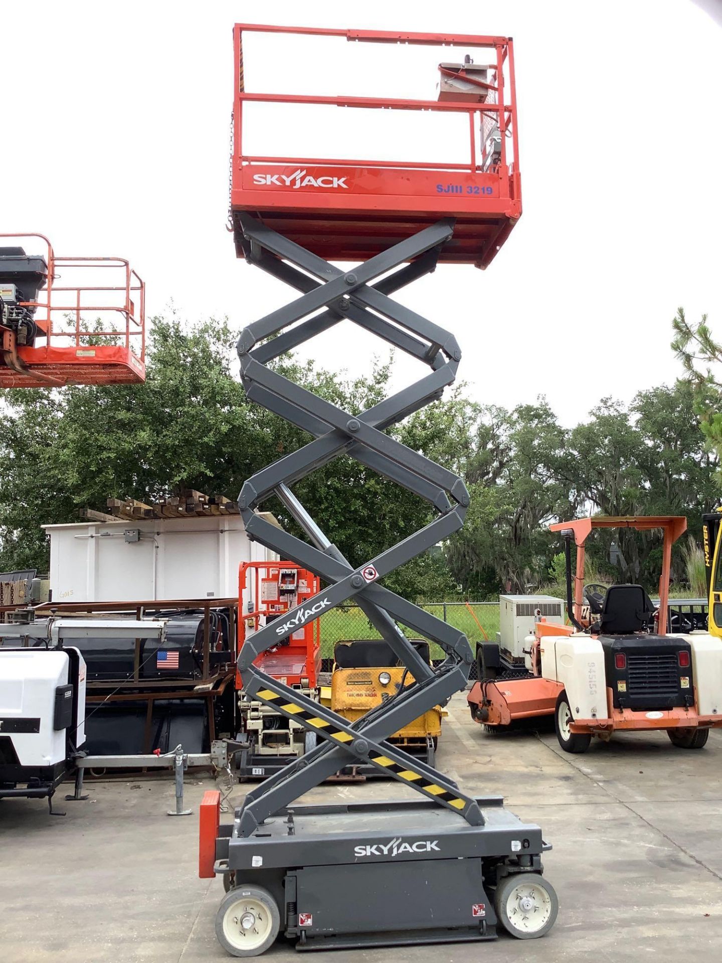 SKYJACK SCISSOR LIFT MODEL SJ III 3219, ELECTRIC, APPROX MAX PLATFORM HEIGHT 19FT, BUILT IN BATTERY