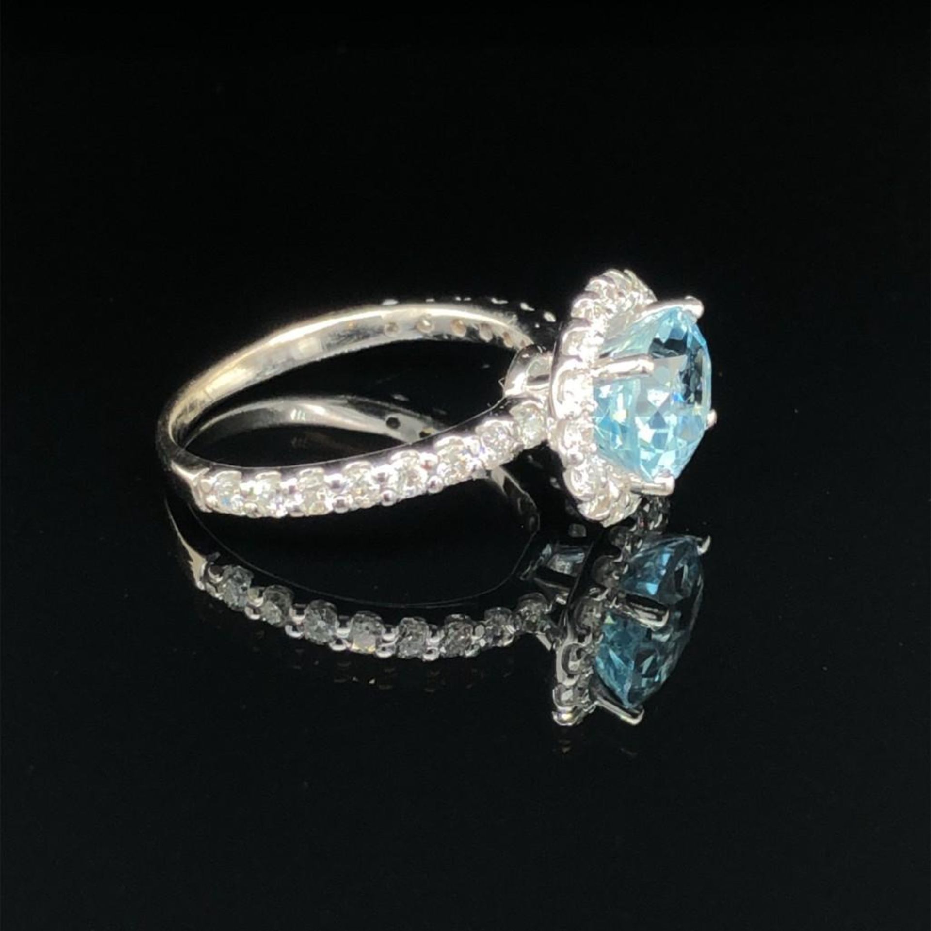 ESTATE AQUA MARINE AND DIAMOND RING. 14k WHITE GOLD. APPROXIMATELY .50ct DIAMONDS. WEIGHS APPROXIMAT