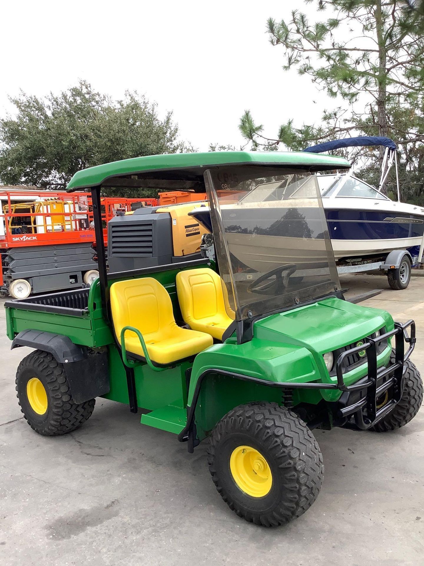 JOHN DEERE ATV, GAS POWERED, MANUAL DUMP BED, NEW SEATS & BATTERIES, RUNS AND OPERATES