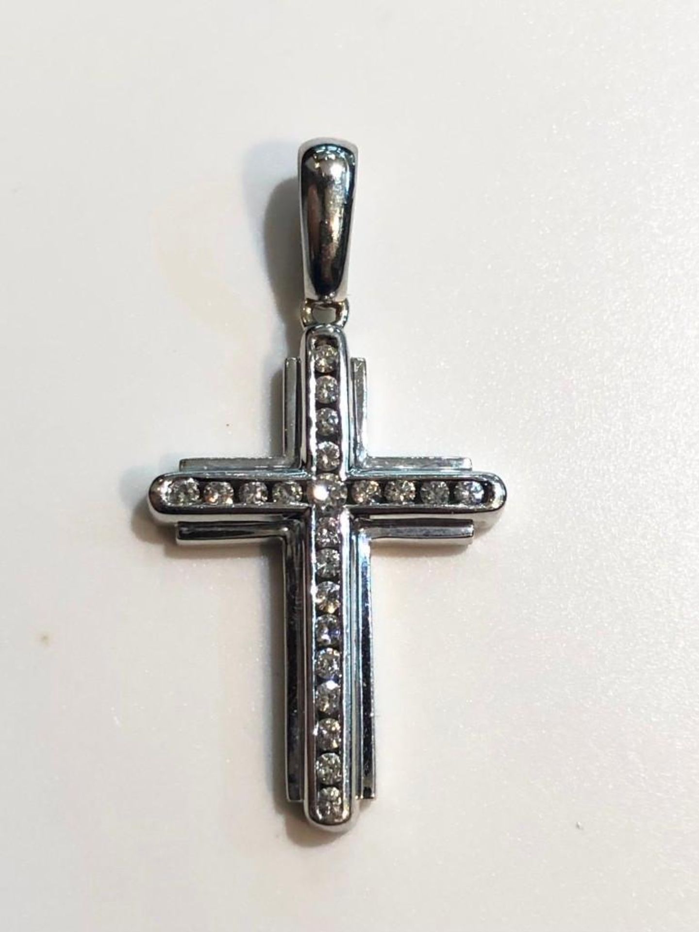 ESTATE DIAMOND CROSS PENDANT. 14K WHITE GOLD. APPROXIMATELY .52CT DIAMONDS. WEIGHS APPROXIMATELY 4 - Image 2 of 3