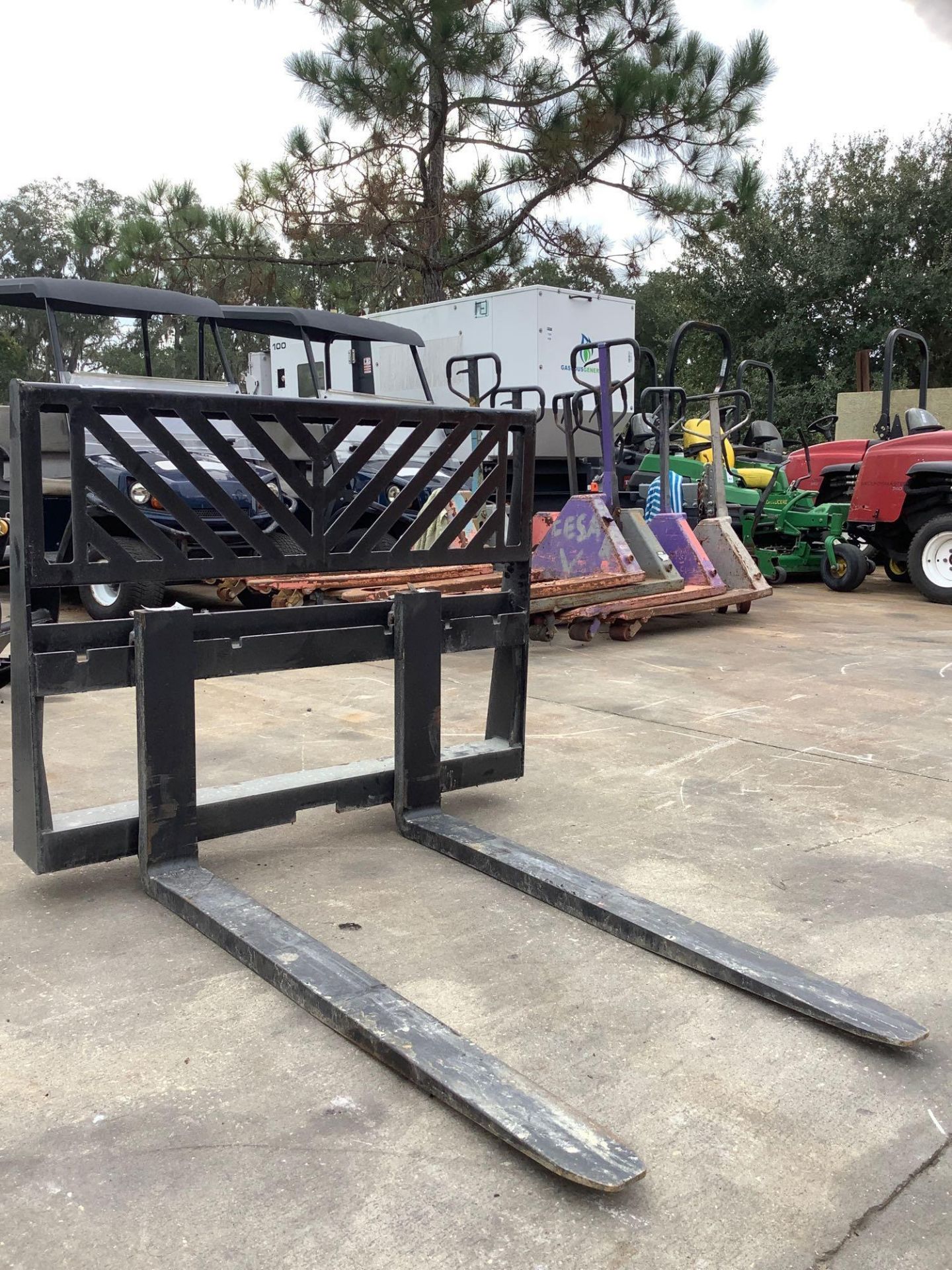 UNUSED UNIVERSAL SKID STEER ATTACHMENT, APPROX 45" WIDTH , APPROX 48'' FORKS