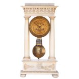 A French Charles X alabaster portico clock, with brass mounts, H 59 - W 30 cm