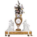 A fine Neoclassical biscuit mantle clock, the central porcelain vase polychrome and gilt decorated w