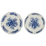 A blue and white floral decorated soft porcelain dish and a strainer, marked Worcester, the second h