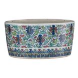 A Chinese doucai washbasin, decorated with scrolling lotus, with a Qianlong mark, Republic period, H