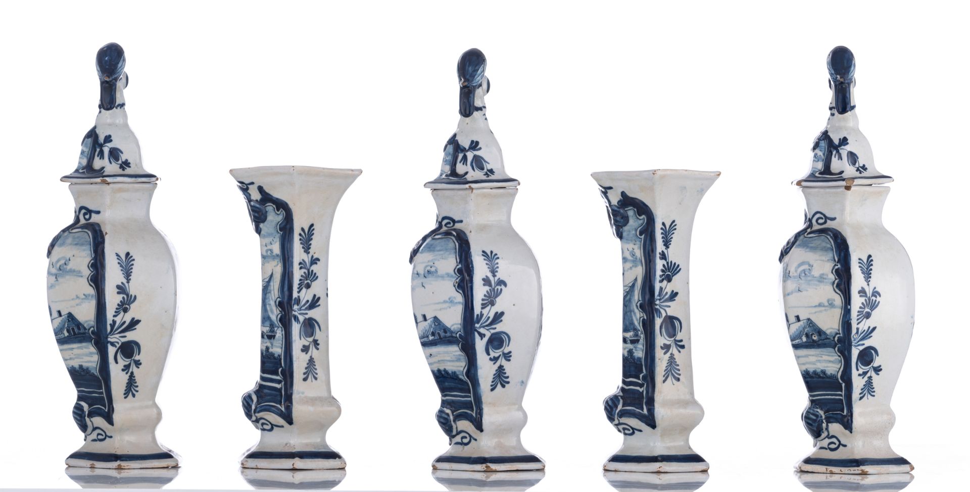 A blue and white relief decorated Delftware five-piece garniture, with on top bird-shaped knobs, the - Bild 2 aus 17