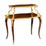 A fine Neoclassical mahogany and rosewood veneered ‚tagŠre tea table, decorated with gilt bronze mou