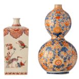 A Japanese Arita Dutch kakiemon decorated sake bottle, each side enamelled with various still lifes