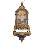 A French R‚gence Boulle work cartel clock, with gilt bronze mounts and on top a Chronos figure, the