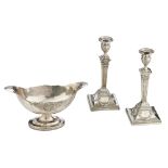 A pair of silver Neoclassical candlesticks, London hallmarks, maker's mark of Joseph Braham, 1886, 9