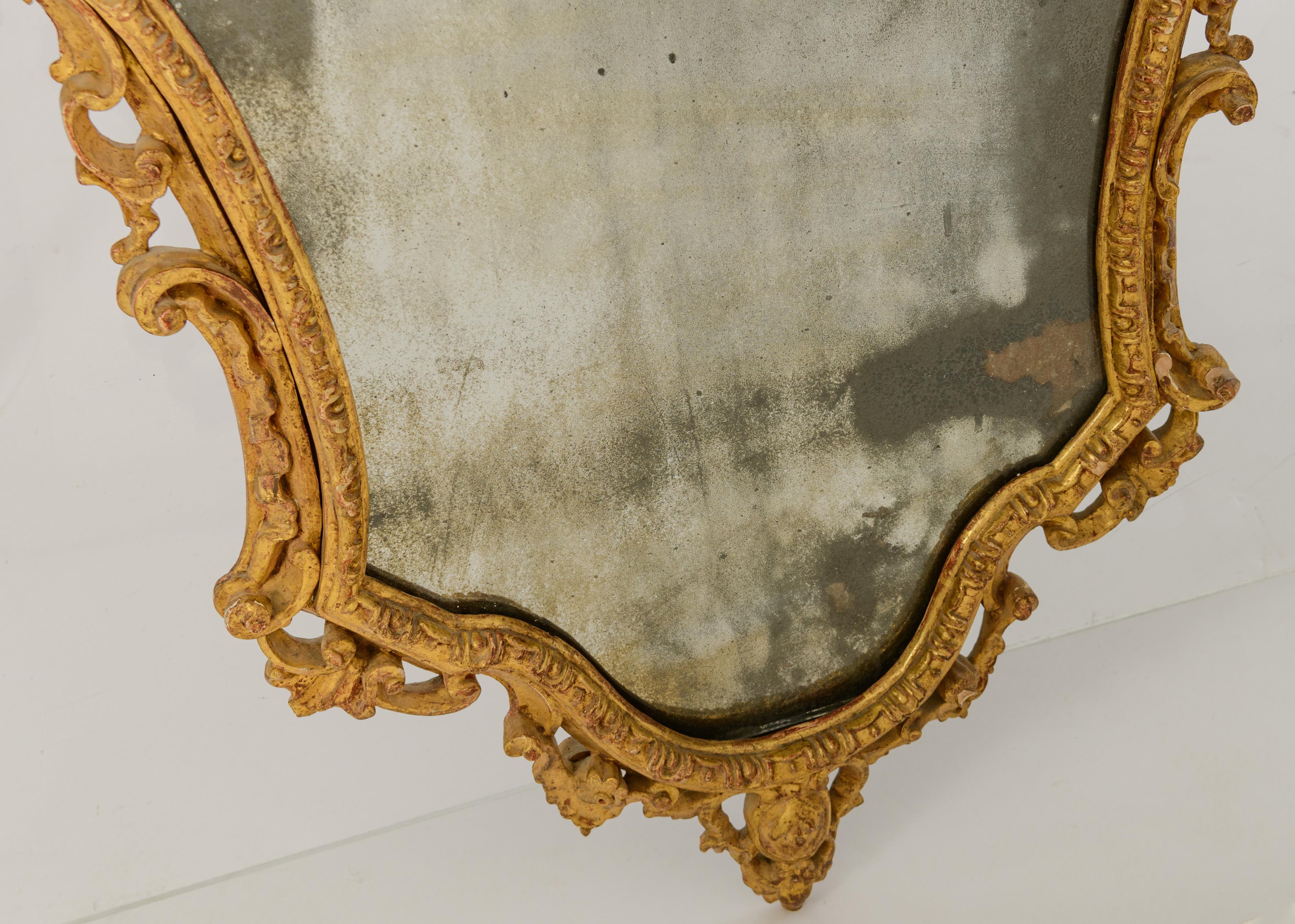 A gilt and finely carved Baroque Venetian wall mirror, decorated with shells and volutes, 18thC, H 1 - Image 4 of 8