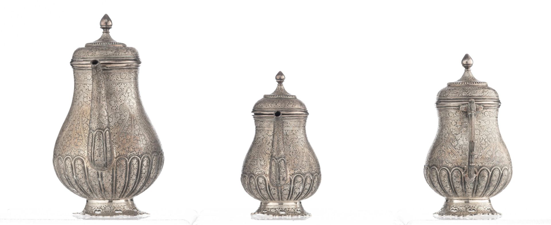 A Persian inspired horror vacui decorated tea set, no visible hallmarks but tested on silver purity, - Image 5 of 10