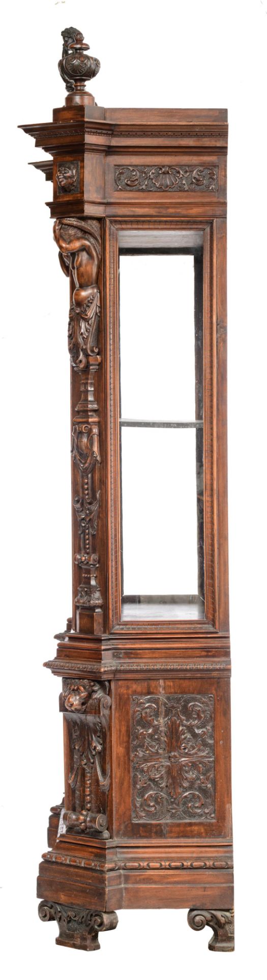 A richly sculpted walnut Renaissance style display cabinet, decorated with scrollwork, lion heads an - Image 3 of 12