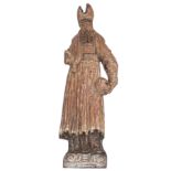 An oak sculpture of a saint, with traces of polychrome paint, 17thC, H 39 cm